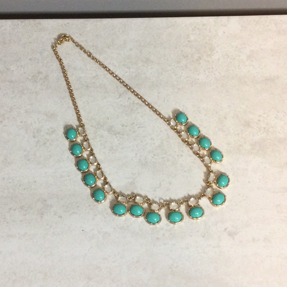 Sea green stone with gold chain necklace